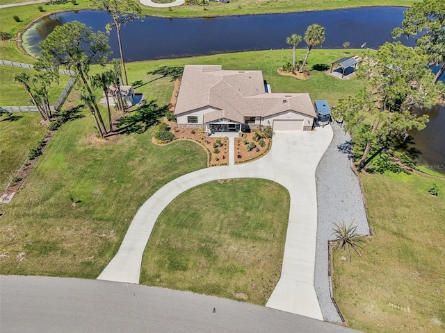 birds eye view of property featuring a water view