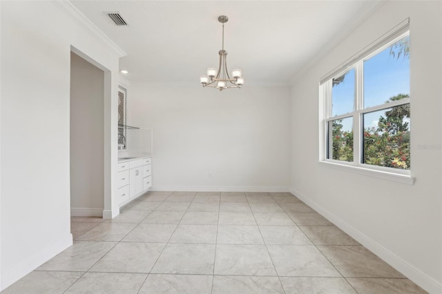 3607 Hidden River Ln, Tavares, FL 32778 - spare room with a chandelier, crown molding, and baseboards