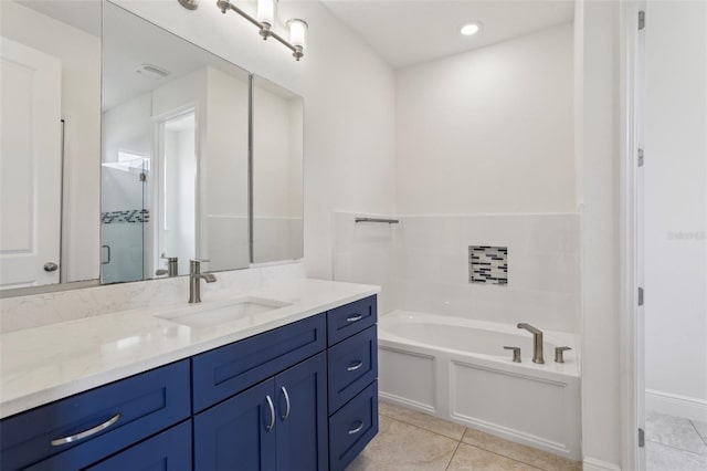 3607 Hidden River Ln, Tavares, FL 32778 - full bath featuring a garden tub, vanity, a stall shower, and tile patterned floors