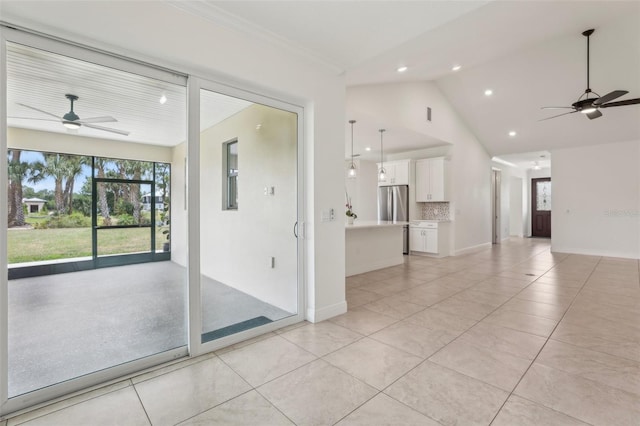3607 Hidden River Ln, Tavares, FL 32778 - unfurnished room featuring ceiling fan, recessed lighting, light tile patterned floors, lofted ceiling, and baseboards