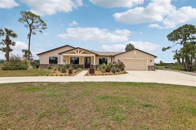 3607 Hidden River Ln, Tavares, FL 32778 - ranch-style home featuring stone siding, driveway, an attached garage, a front yard, and stucco siding