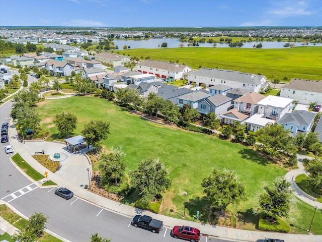 aerial view with a residential view and a water view