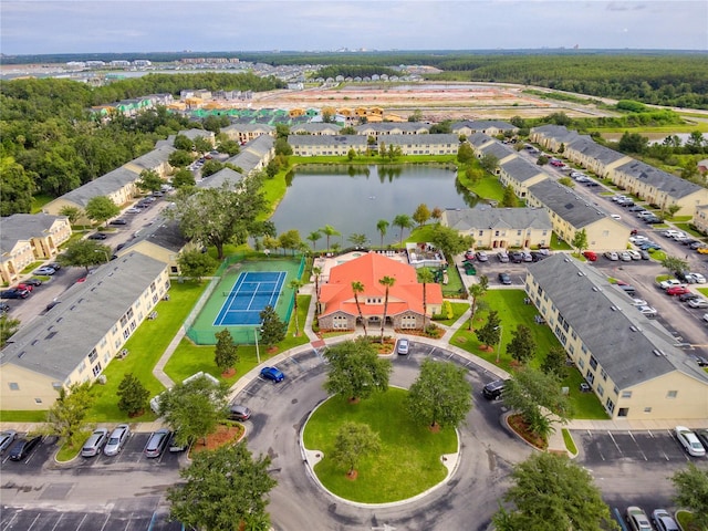 aerial view with a water view and a residential view