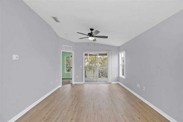 unfurnished room featuring light wood-style floors, baseboards, and visible vents