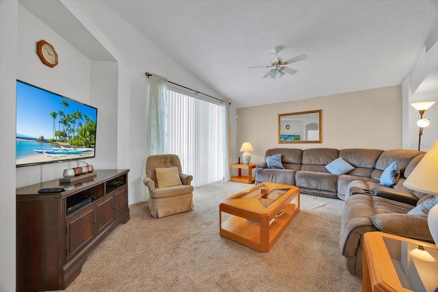 living room with light carpet, ceiling fan, vaulted ceiling, and a textured ceiling