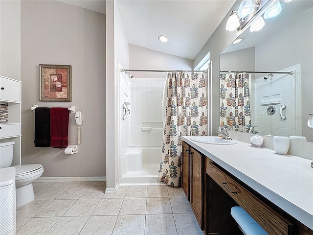 full bathroom featuring vanity, lofted ceiling, a tile shower, tile patterned floors, and toilet