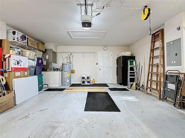 garage with electric water heater, a garage door opener, and freestanding refrigerator