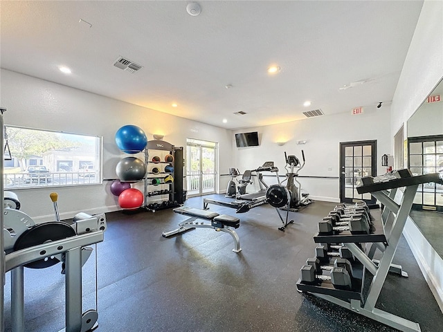 exercise room featuring recessed lighting, visible vents, baseboards, and french doors