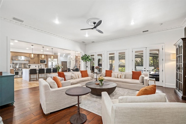 living room featuring a ceiling fan, dark wood-style floors, visible vents, recessed lighting, and french doors