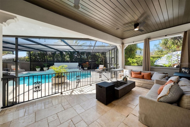 exterior space with wood ceiling and ceiling fan