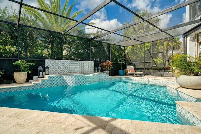 outdoor pool featuring a lanai