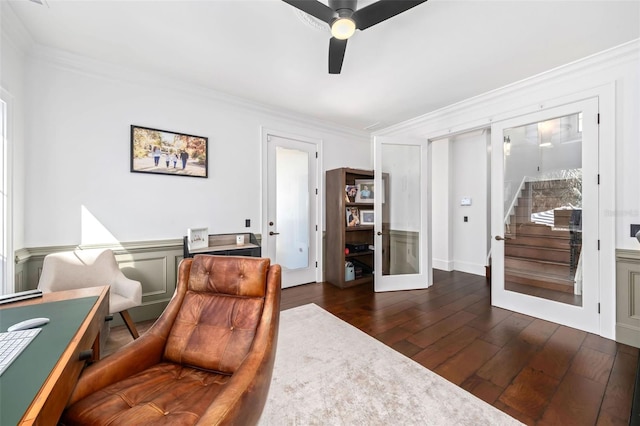 interior space with french doors, crown molding, ceiling fan, and dark wood-style flooring