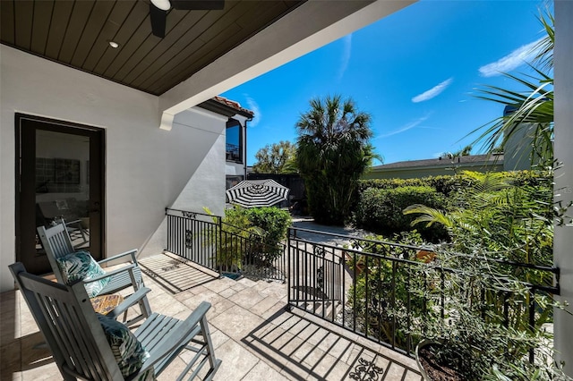 balcony featuring ceiling fan