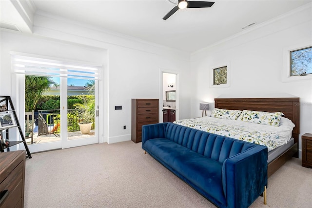 bedroom with visible vents, access to outside, connected bathroom, crown molding, and light colored carpet