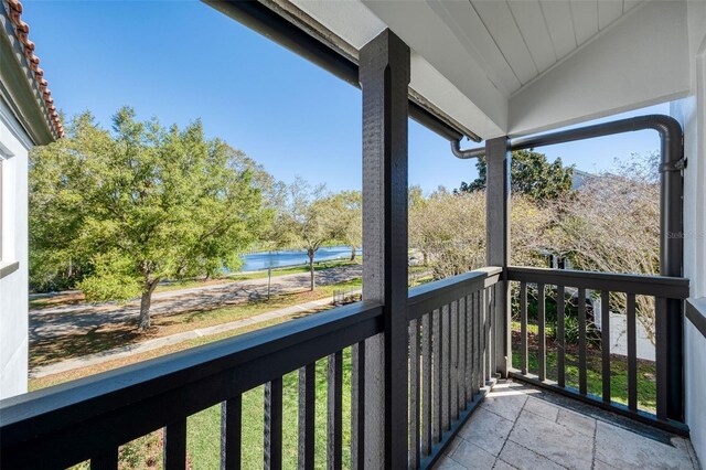 balcony featuring a water view