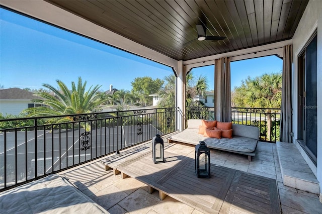 balcony featuring ceiling fan