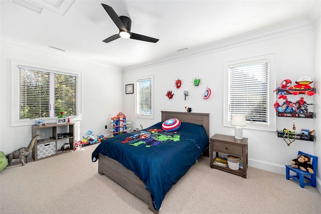 bedroom with ceiling fan, visible vents, carpet floors, and ornamental molding