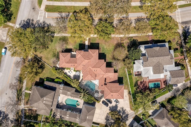 birds eye view of property with a residential view