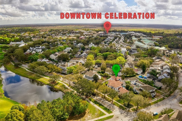 aerial view featuring a water view and a residential view