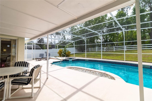 view of swimming pool featuring an in ground hot tub, a fenced in pool, a patio area, glass enclosure, and a fenced backyard