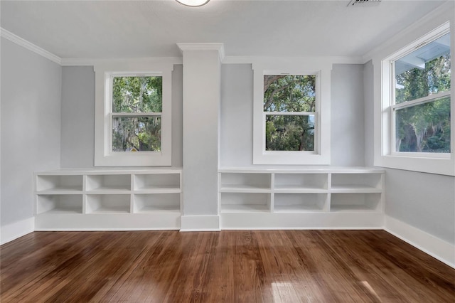 415 S 9th St, Leesburg, FL 34748 - spare room featuring baseboards, ornamental molding, hardwood / wood-style flooring, and a healthy amount of sunlight
