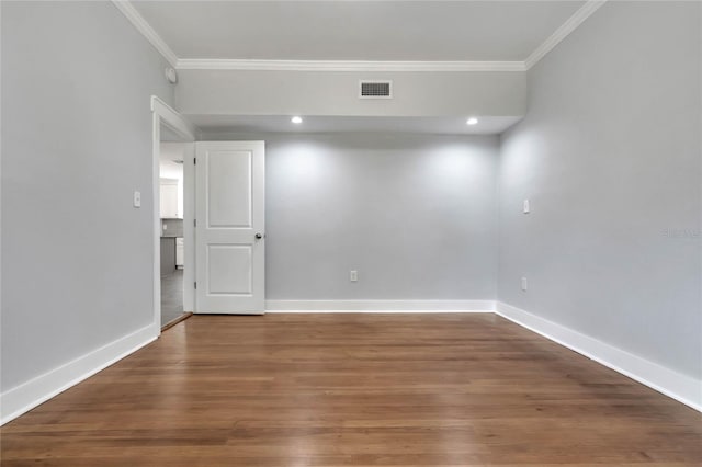 415 S 9th St, Leesburg, FL 34748 - spare room featuring crown molding, recessed lighting, baseboards, visible vents, and wood finished floors