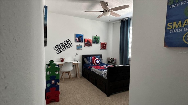 carpeted bedroom with ceiling fan