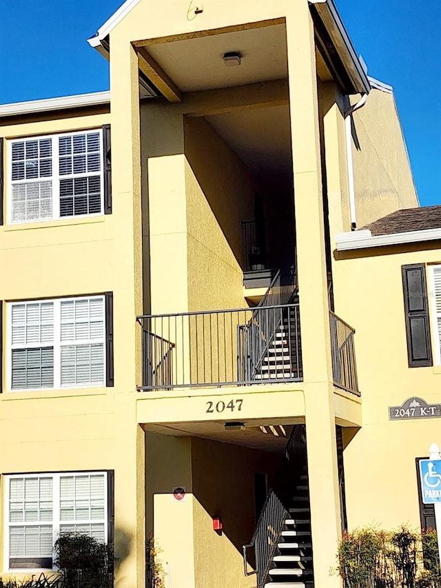 view of property with stairway