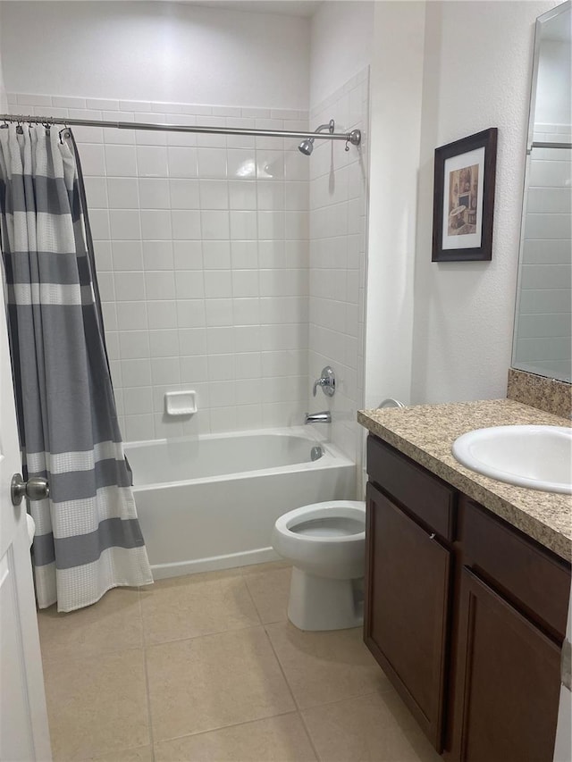 bathroom with tile patterned flooring, shower / tub combo, toilet, and vanity