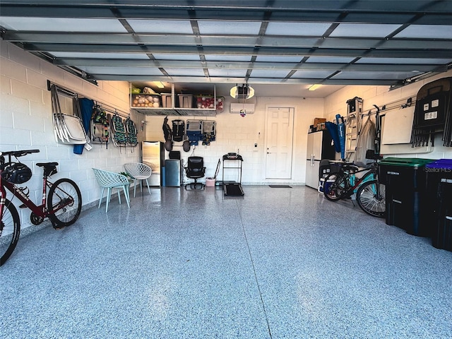 garage featuring concrete block wall