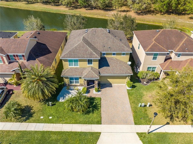 drone / aerial view with a water view