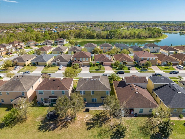 aerial view featuring a residential view and a water view