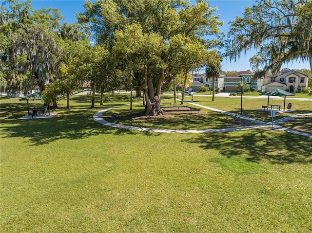 view of home's community featuring a lawn