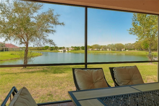 sunroom with a water view