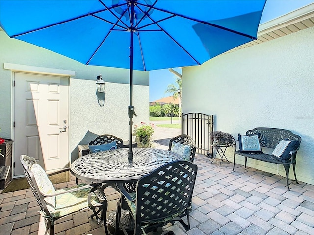 view of patio featuring outdoor dining space