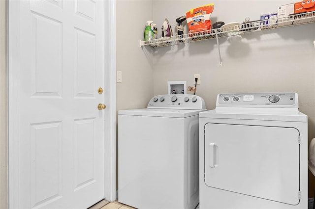 laundry area featuring independent washer and dryer and laundry area