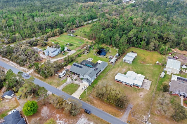 bird's eye view with a view of trees