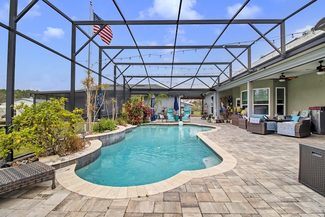 outdoor pool with a patio area, glass enclosure, outdoor lounge area, and a ceiling fan