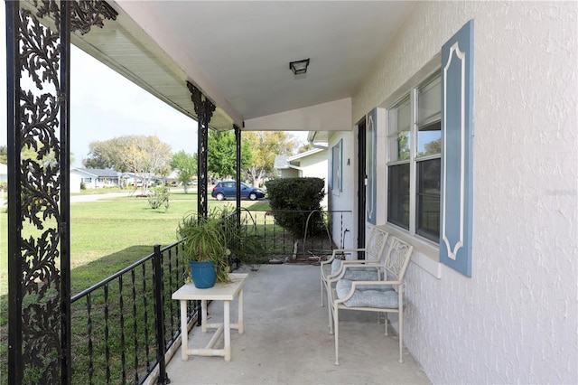 view of patio featuring a porch