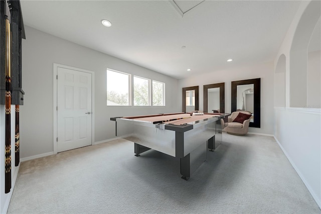 playroom with light carpet, recessed lighting, arched walkways, and baseboards