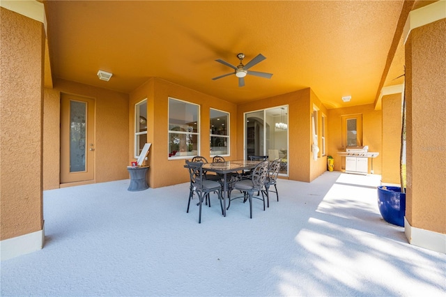 view of patio / terrace featuring outdoor dining space and ceiling fan