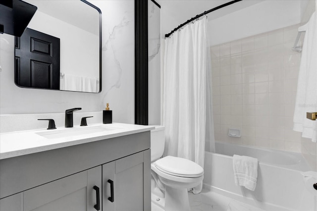 bathroom featuring shower / bath combo with shower curtain, marble finish floor, toilet, and vanity