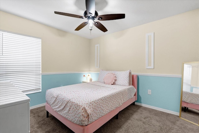 bedroom with baseboards, carpet floors, and a ceiling fan