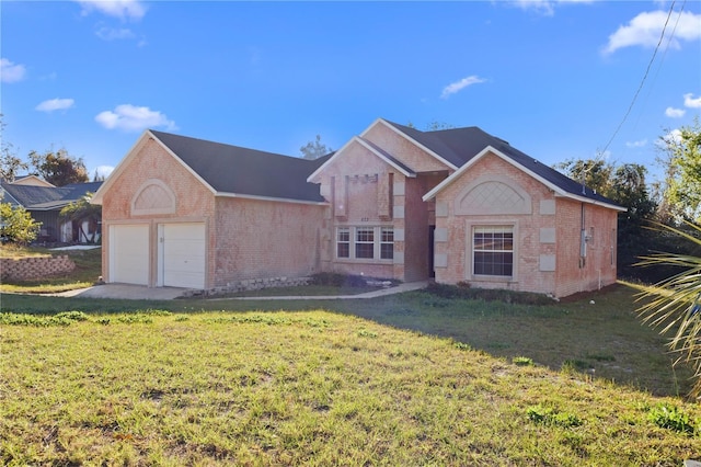 view of front facade with a front lawn, a garage, and brick siding