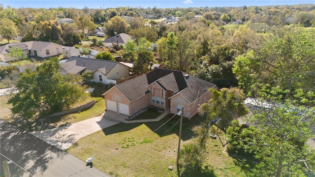 drone / aerial view with a view of trees