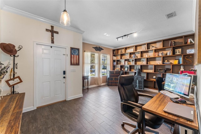 office space featuring visible vents, a textured ceiling, crown molding, baseboards, and dark wood-style flooring