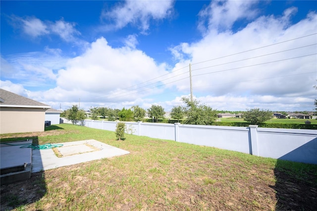 view of yard featuring a fenced backyard