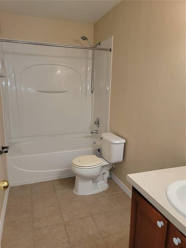 full bathroom featuring bathing tub / shower combination, baseboards, toilet, and vanity