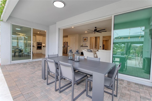 view of patio featuring outdoor dining space