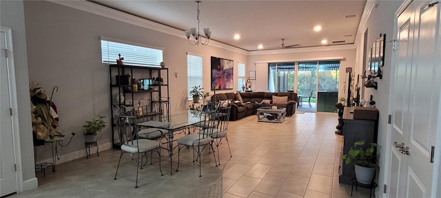 dining space featuring recessed lighting, crown molding, baseboards, and ceiling fan